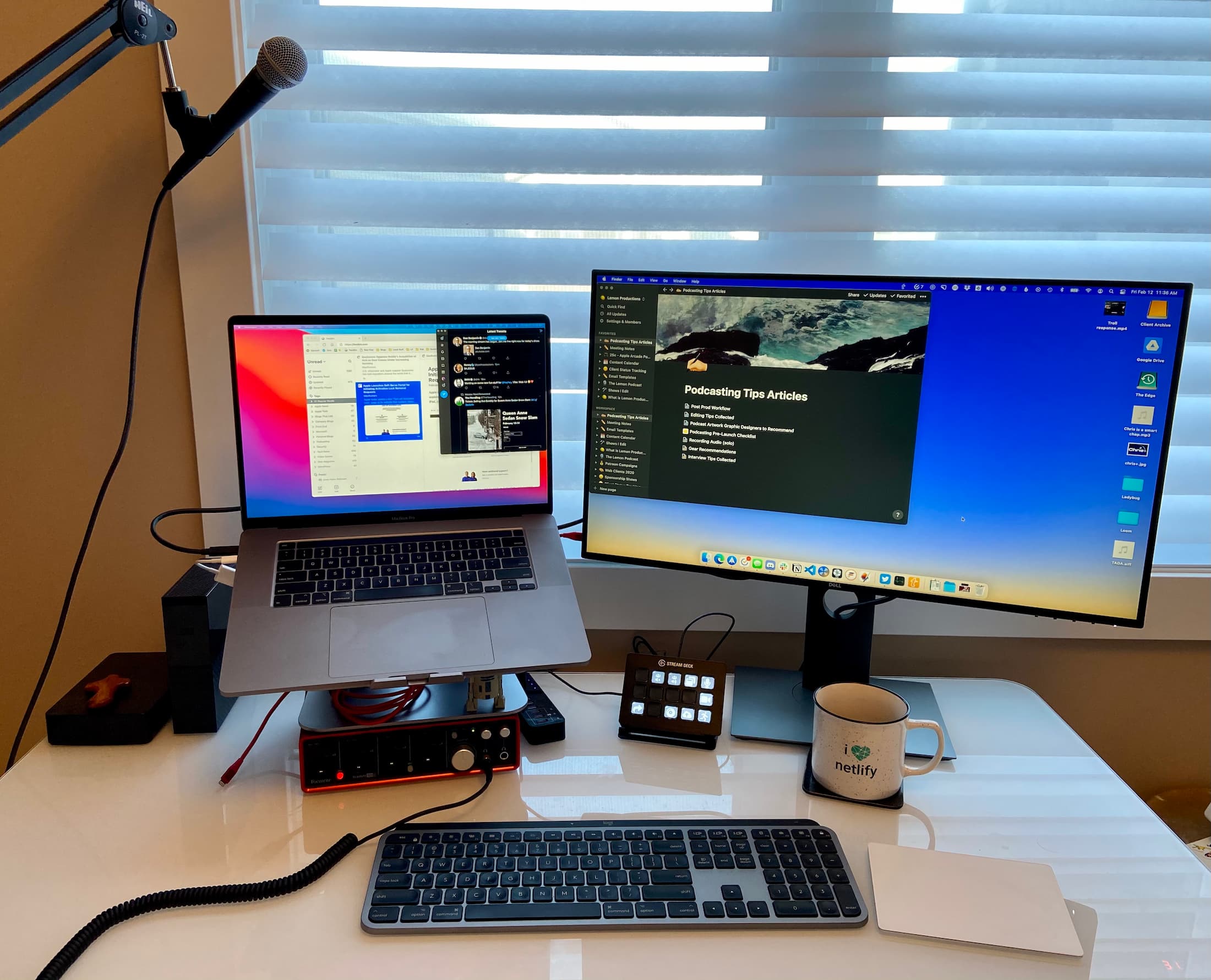 My desk with a computer, monitor, keyboard, and trackpad.